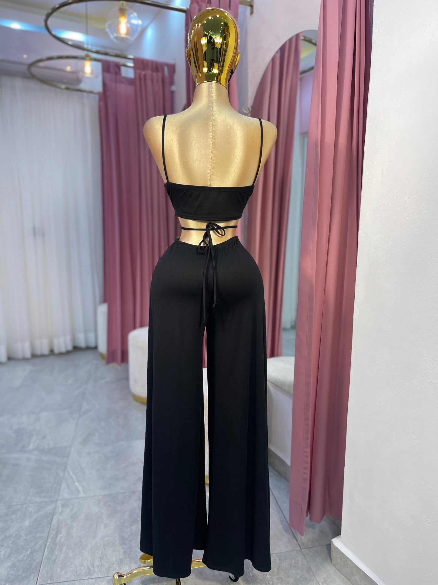 JUMPSUIT NEGRO ARO DORADO