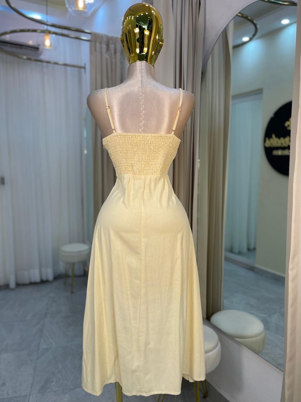 VESTIDO MIDI AMARILLO BOTONES CAMP.